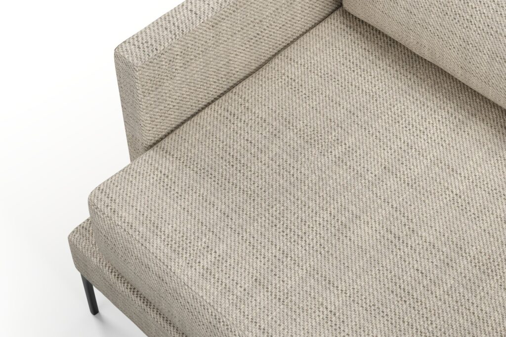 corner view of a beige chair upholstered in fibreguard pro fabric