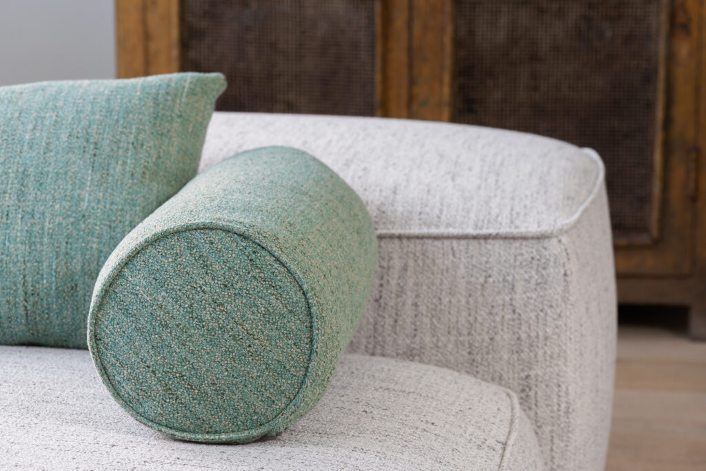 soothing coloured boucle upholstery fabric couch